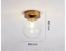 Modern brass & black glass ball ceiling light for living room