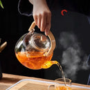 Modern glass teapot with wood handle for kitchen and dining room