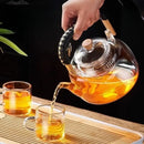 Modern glass teapot with wood handle for kitchen and dining room