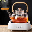 Modern glass teapot with wood handle for kitchen and dining room