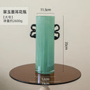 Modern mint green glass vase with black handles living room decor