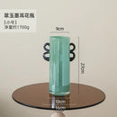 Modern mint green glass vase with black handles living room decor