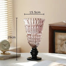 Textured clear glass vase with black base living room decor