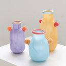 Whimsical colorful glass vase with spiral handle living room decor