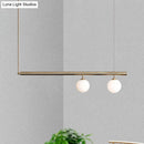 Minimalist golden glass sphere pendant light dining room