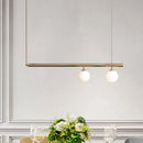 Minimalist golden glass sphere pendant light dining room