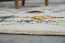 Traditional beige azilal rug with geometric patterns for living room