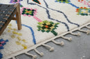 Traditional beige azilal rug with geometric patterns for living room
