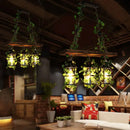 DecorBites™ Industrial Clear Glass Hanging Lantern with 3 Cylindrical Heads - Restaurant Island Light with Artistic Plant Deco