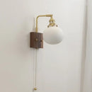 Brass and wood globe wall sconce bedroom light fixture