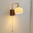 Brass and wood globe wall sconce bedroom light fixture