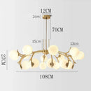 Organic gold led chandelier lighting with frosted globes for dining room