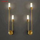 Minimalist gold candlestick wall light with frosted glass for bedroom