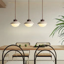 Minimalist beige concrete and wood led pendant light dining room