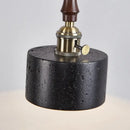 Black travertine cylindrical pendant light for dining room