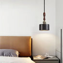 Black travertine cylindrical pendant light for dining room