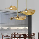 Gold hammered lotus flower pendant light for dining room