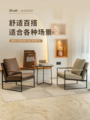 Modern brown leather lounge chair reception area black metal frame