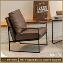 Modern brown leather lounge chair reception area black metal frame