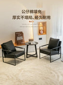 Modern brown leather lounge chair reception area black metal frame