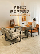 Modern brown leather lounge chair reception area black metal frame
