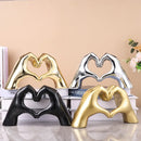 Glossy gold silver & black gesture heart sculpture living room decor