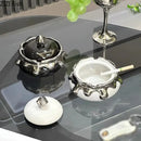 Modern black & white ceramic ashtray with silver drip – living room decor