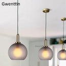 Luxe glass ball pendant lights brass and frosted glass dining room