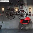 DecorBites™ Metallic Pendant Light: Antique 3-Head Wagon Wheel Design for Restaurants and Hanging Islands, with Decorative Valve