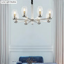 DecorBites™ Modern 6-Head Clear Glass Candle Chandelier: Chrome Ceiling Pendant Fixture with Adjustable Chain