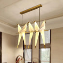 DecorBites™ Modern Bird-Shaped Island Pendant Light: 3/4/5 Golden Hanging Lights for Bedroom
