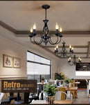 Modern black iron scrollwork chandelier living room light