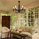 Modern black iron scrollwork chandelier living room light