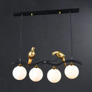 Modern bird branch island pendant light – dining room amber glass