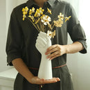DecorBites™ Modern Ceramic Arm Shaped Flower Vase