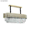 Modern gold island pendant light with crystal prisms dining room