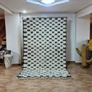 Black and white checkered moroccan handmade blessed beni ourain rug bedroom