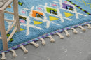 Blue geometric moroccan handmade azilal rug bedroom decor with tassels