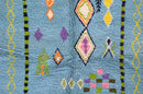 Blue geometric moroccan handmade azilal rug bedroom decor with tassels