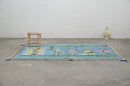 Blue geometric moroccan handmade azilal rug bedroom decor with tassels
