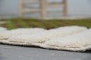 Traditional moroccan handmade cream & green azilal rug bedroom decor