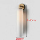 DecorBites™ Moroccan Title: Sleek Glass Wall Sconce