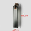 DecorBites™ Moroccan Title: Sleek Glass Wall Sconce