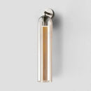 DecorBites™ Moroccan Title: Sleek Glass Wall Sconce