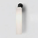 DecorBites™ Moroccan Title: Sleek Glass Wall Sconce