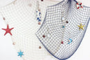 Nautical theme beige & navy blue fishing net wall decor living room