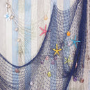 Nautical theme beige & navy blue fishing net wall decor living room