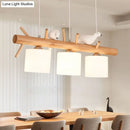 DecorBites™ Nordic Wood Pendant Light with Opal Glass Cylinder and Resin Bird Decor