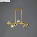DecorBites™ Postmodern Gold Finish Amber Glass Ball Island Hanging Lamp for Table Illumination