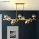 DecorBites™ Postmodern Gold Finish Amber Glass Ball Island Hanging Lamp for Table Illumination